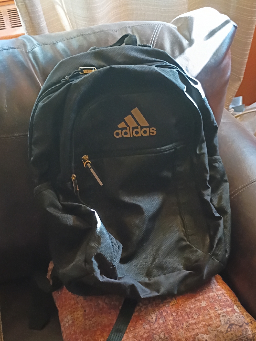 adidas Black Backpack with Gold Logo Accents